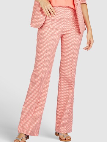 MARC AUREL Flared Pants in Orange: front