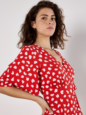 Robe ' ' Apricot en rouge