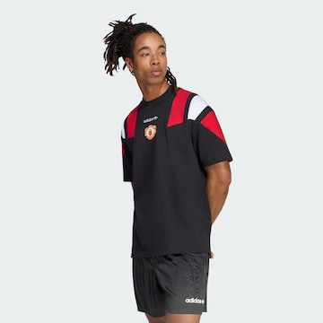 ADIDAS PERFORMANCE Λειτουργικό μπλουζάκι 'Manchester United' σε μαύρο: μπροστά