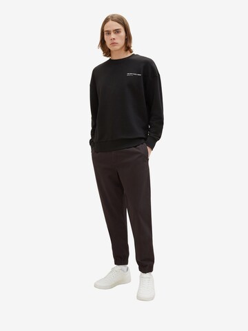 TOM TAILOR DENIM Tapered Trousers in Black: front