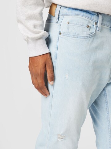 HOLLISTER Tapered Jeans in Blue