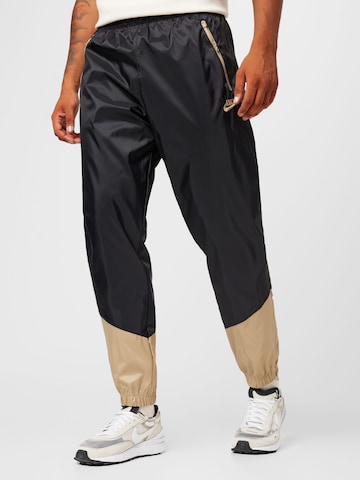 Nike Sportswear Дънки Tapered Leg Панталон в черно: отпред
