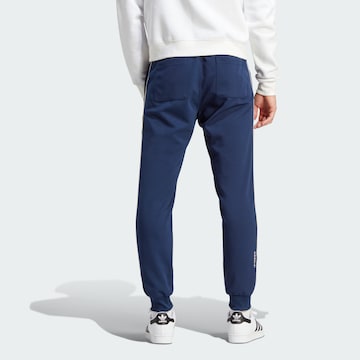 ADIDAS ORIGINALS Tapered Sportbroek 'Track' in Blauw