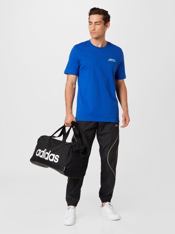 ADIDAS ORIGINALS T-Shirt 'Graphic Stoked Fish Flowers' in Blau