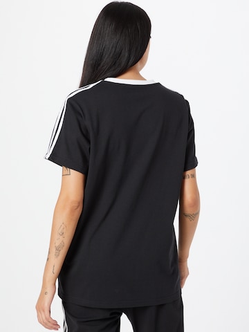 ADIDAS SPORTSWEAR - Camiseta funcional 'Essentials 3-Stripes' en negro