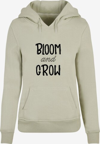 Merchcode Sweatshirt 'Spring - Bloom and grow' in Green: front