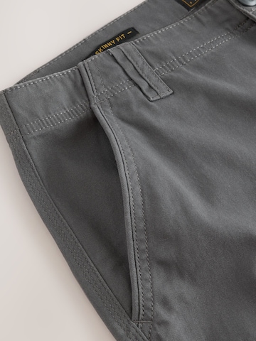 Skinny Pantaloni cu buzunare de la Next pe gri