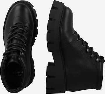 Copenhagen - Botines con cordones en negro