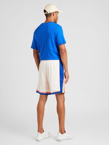 NIKE Regular Workout Pants 'CFC' in Blue