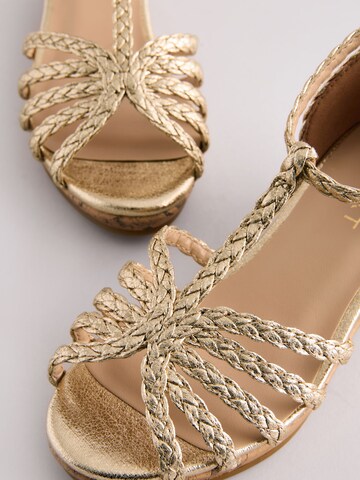 Next - Sandalias en oro