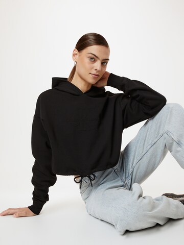 Calvin Klein Jeans Sweatshirt in Schwarz: predná strana