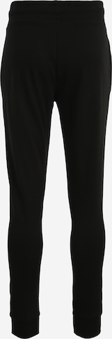 Effilé Pantalon de sport 4F en noir