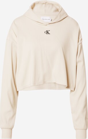 T-shirt Calvin Klein Jeans en beige : devant