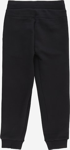 Effilé Pantalon PEAK PERFORMANCE en noir