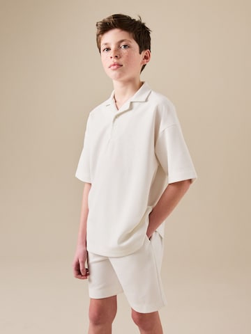 Next Set in Wit: voorkant