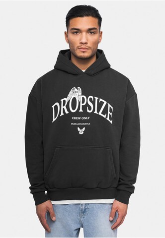 Sweat-shirt 'Pray Love Hustle' Dropsize en noir : devant