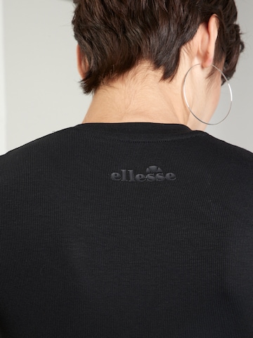 ELLESSE Póló 'Reino' - fekete