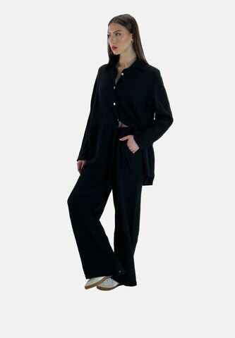 Elara Huispak in Zwart