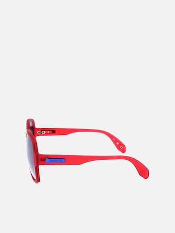 ADIDAS ORIGINALS Sonnenbrille‌‌‌‌‌‌‌‌‌ in Rot
