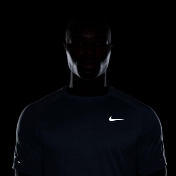 NIKE Performance Shirt 'DFADV STRIDE' in Blue