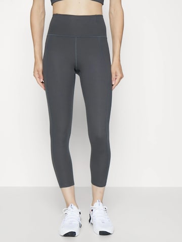Girlfriend Collective Skinny Sportbroek in Grijs: voorkant