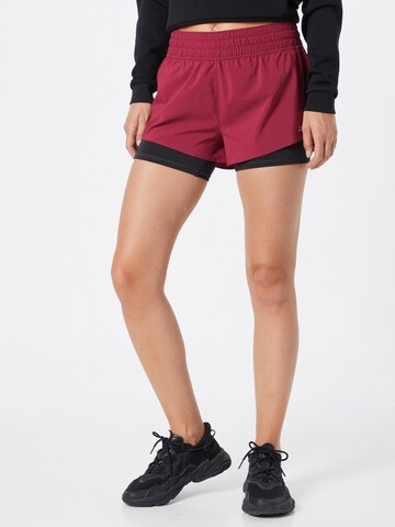 Skinny Pantalon de sport Reebok en rose : devant