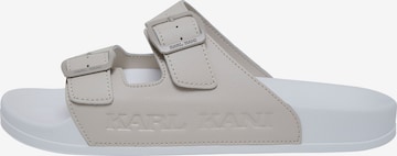 Karl Kani Pantolette i beige: framsida