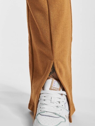 Karl Kani Loose fit Pants in Brown