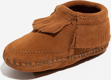 Minnetonka Saappaat 'Riley Softsole' värissä ruskea