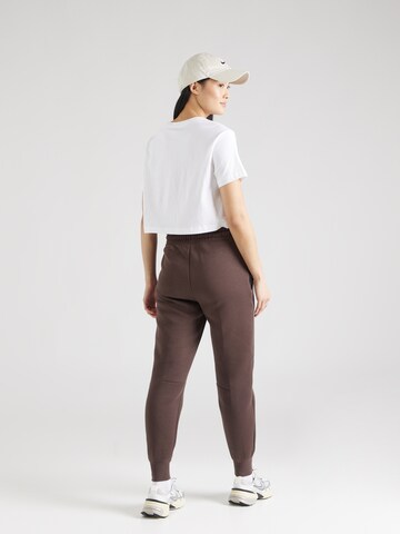 Effilé Pantalon Nike Sportswear en marron