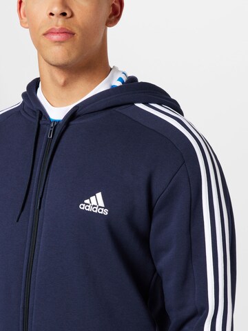 ADIDAS SPORTSWEAR - Sudadera con cremallera deportiva 'Essentials' en azul