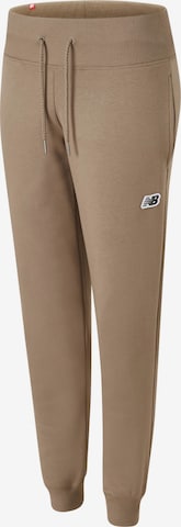 new balance Tapered Pants in Brown: front