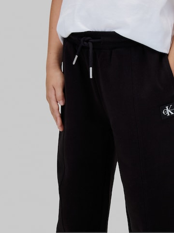 Tapered Pantaloni di Calvin Klein Jeans in nero