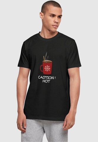 Merchcode Shirt 'Caution Hot' in Schwarz: predná strana