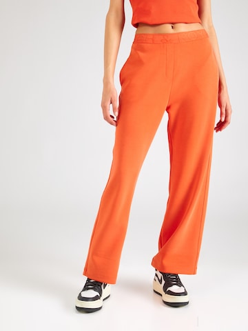 Rich & Royal - Perna larga Calças em laranja: frente
