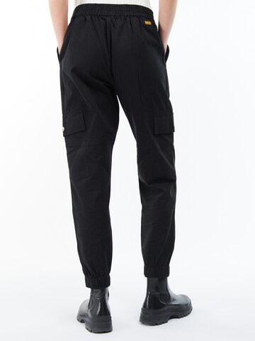 Tapered Pantaloni cargo 'Monaco' di Barbour International in nero