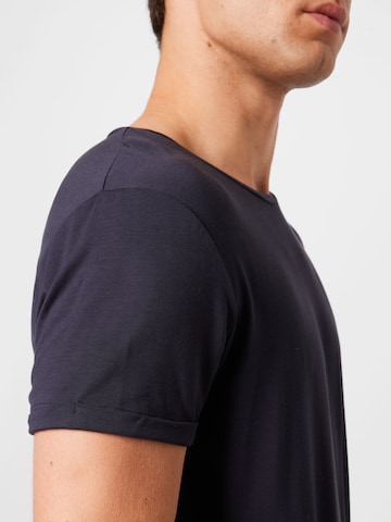 CURARE Yogawear Functioneel shirt 'Flow' in Blauw
