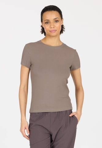 Athlecia Functioneel shirt 'Tinashe' in Bruin: voorkant