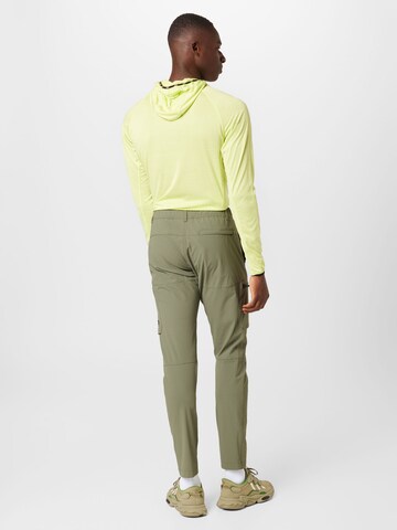 PEAK PERFORMANCE Slimfit Παντελόνι φόρμας σε πράσινο