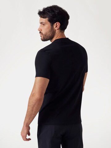 GUESS T-Shirt in Schwarz