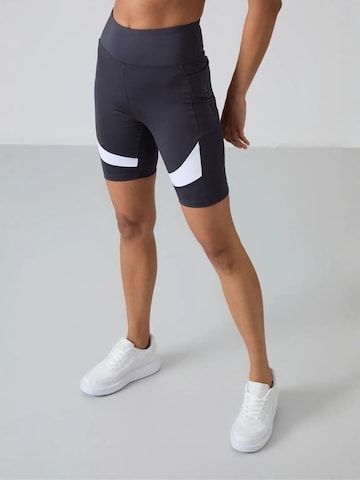 Tommy Life - Tapered Leggings 'Gamaschen' em mistura de cores
