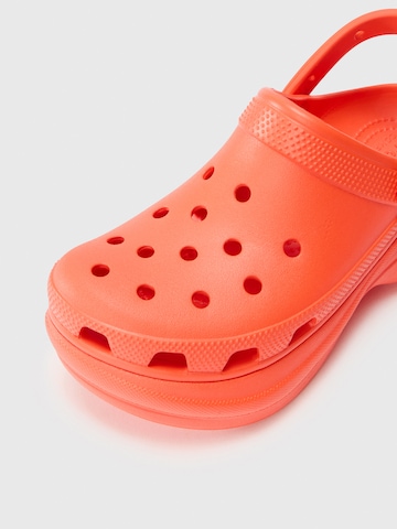 Crocs Puukengät & Crocks-jalkineet 'Classic Bae' värissä oranssi