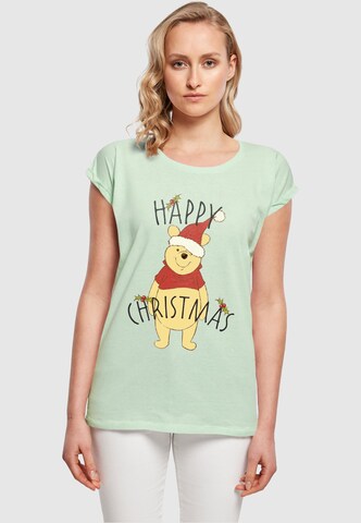 ABSOLUTE CULT T-Shirt 'Winnie The Pooh - Happy Christmas Holly' in Grün: predná strana