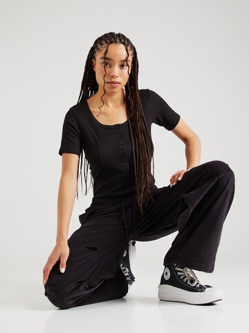 Maglietta di Champion Authentic Athletic Apparel in nero