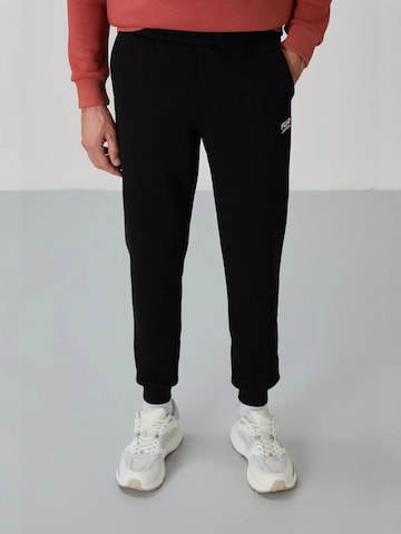 Tommy Life Joggingpak in Rood