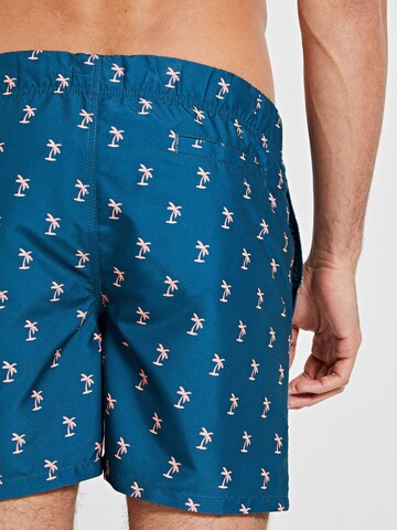 Shorts de bain 'Palmtree' Shiwi en bleu