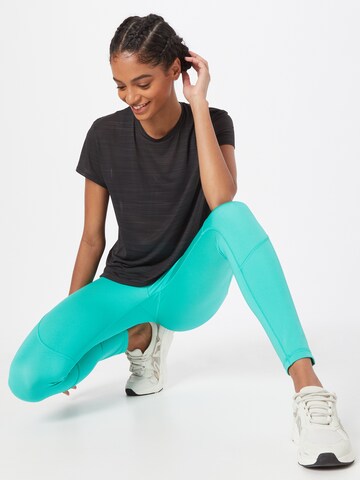 Skinny Pantalon de sport Reebok en vert