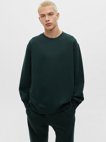 Bluză de molton de la Pull&Bear pe verde: față