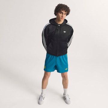 ADIDAS PERFORMANCE - Loosefit Pantalón deportivo 'Kolumbien' en azul
