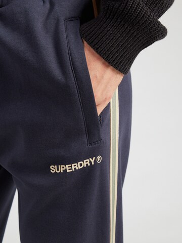 Superdry Tapered Hose 'Tech Cult' in Blau